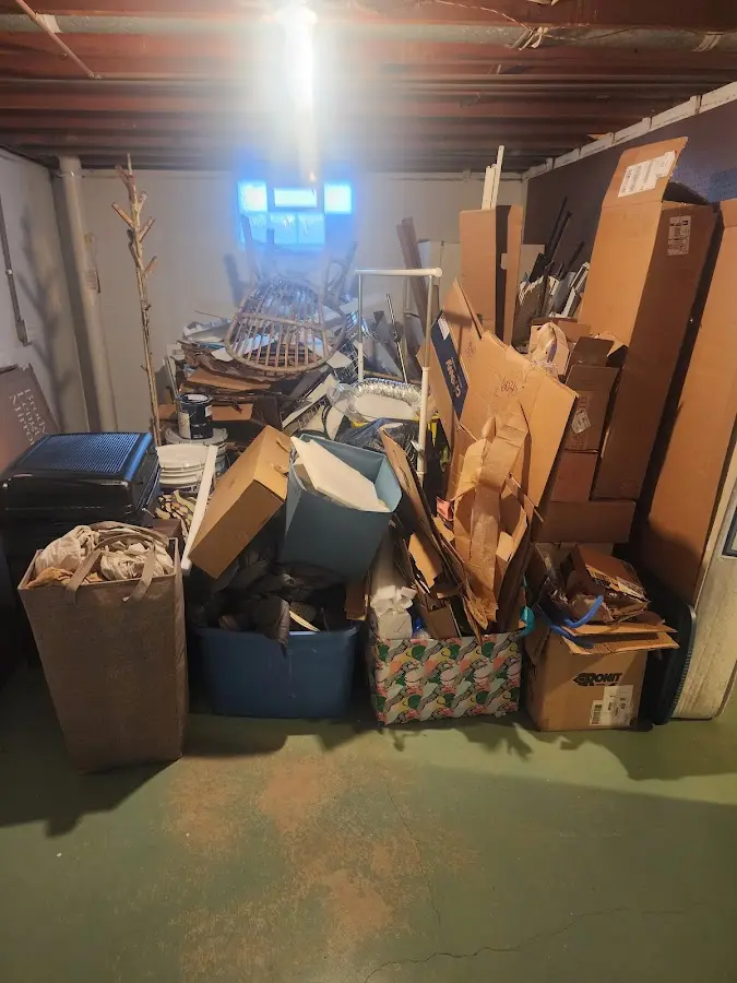 Roll-off dumpster container at job site for Yard Waste Dumpster Rental in Delafield